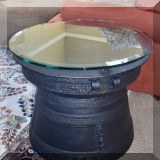 F03. Metal round side table. 21”h x 24”d 